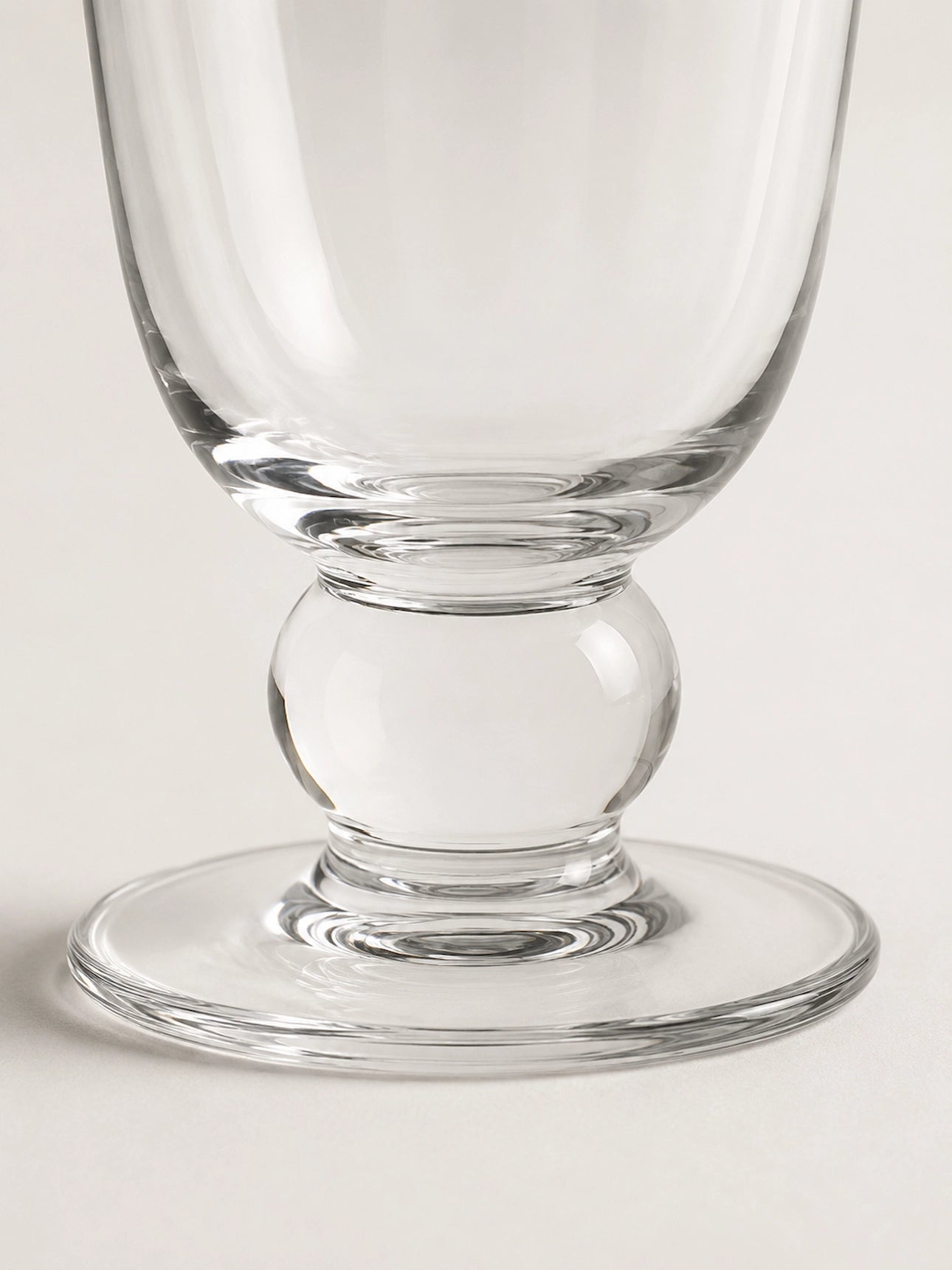 TALL STEMMED GLASS VASE
