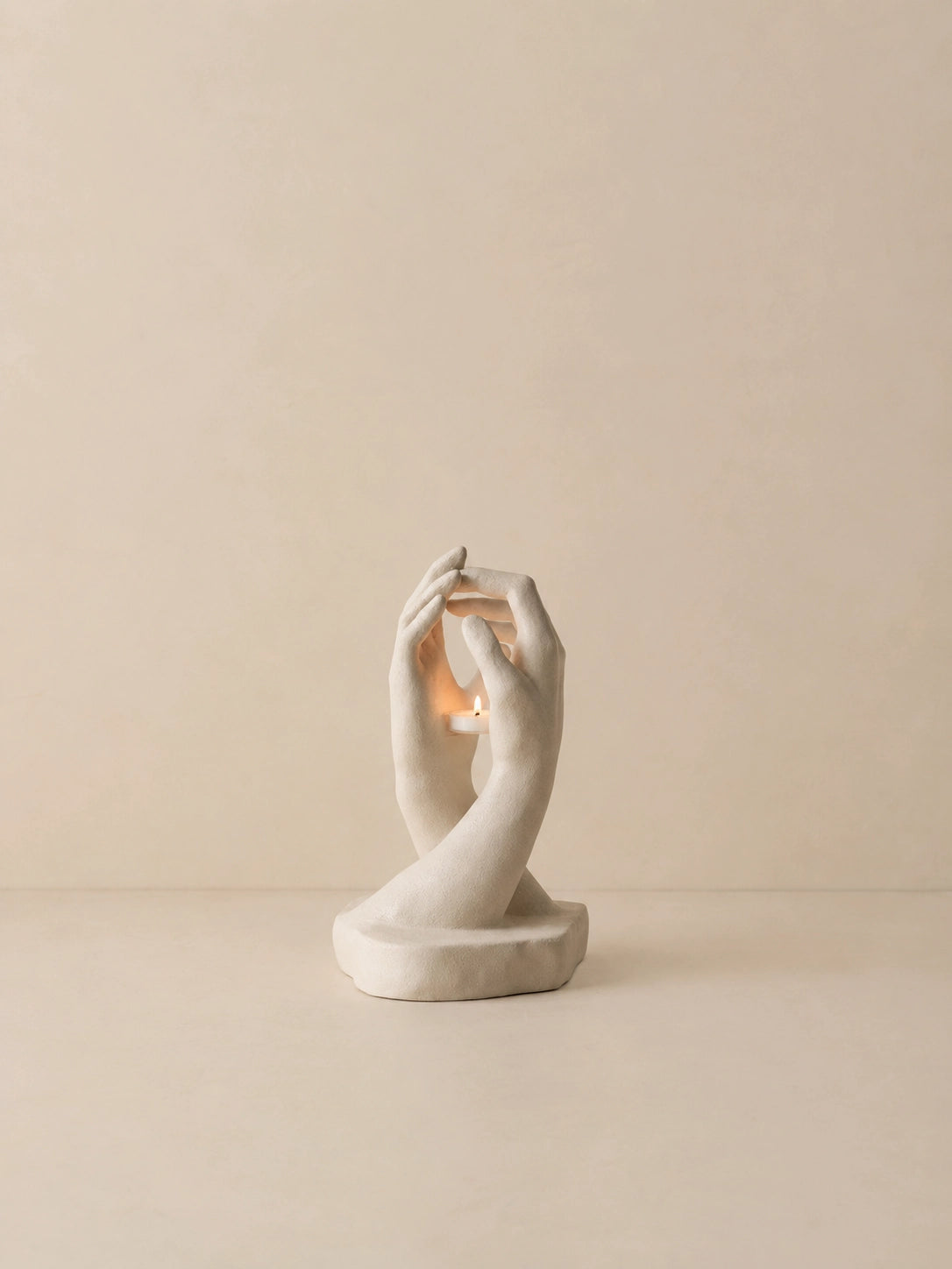 INTERLACED HANDS CANDLE HOLDER