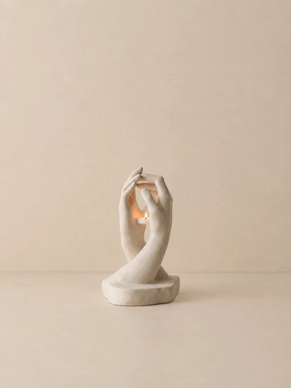 INTERLACED HANDS CANDLE HOLDER