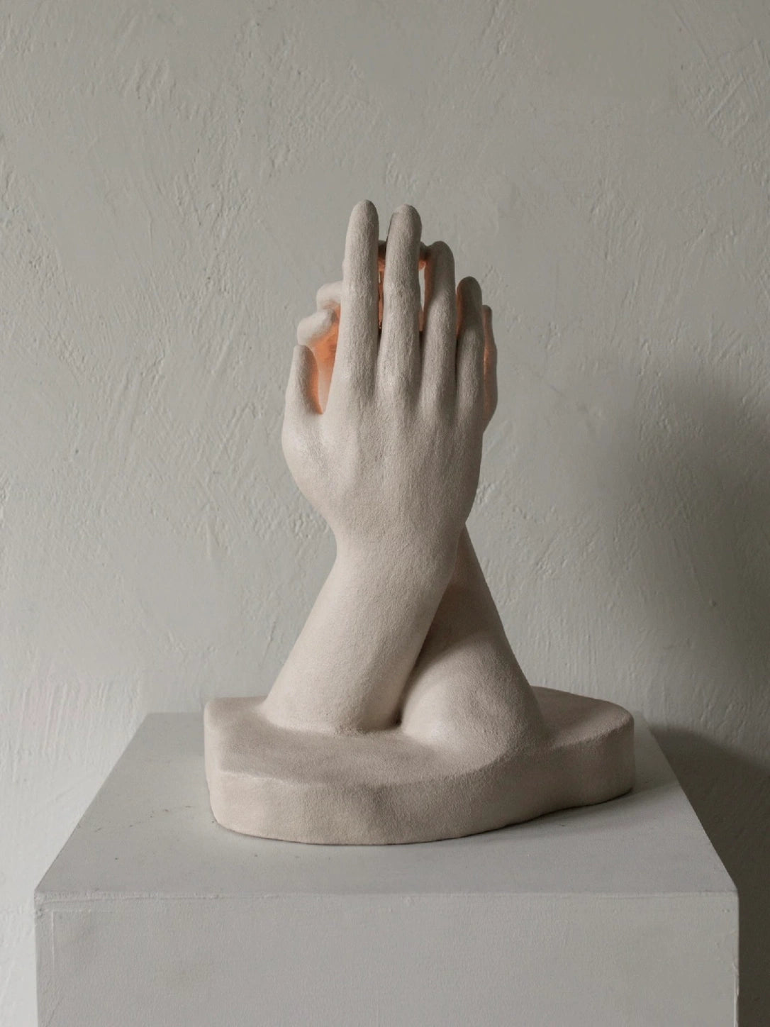 INTERLACED HANDS CANDLE HOLDER