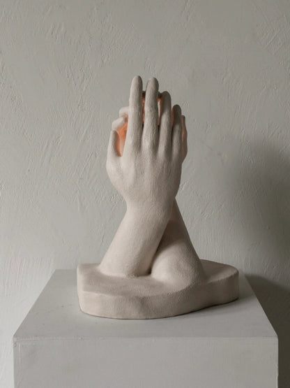 INTERLACED HANDS CANDLE HOLDER