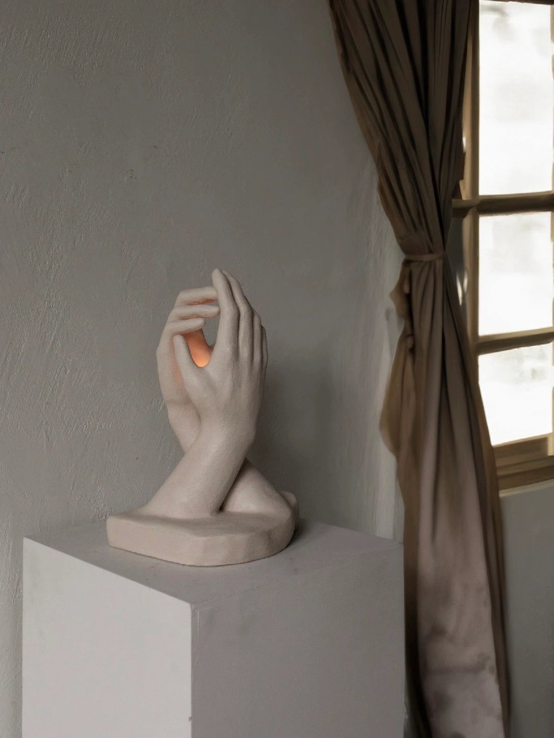 INTERLACED HANDS CANDLE HOLDER