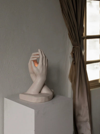 INTERLACED HANDS CANDLE HOLDER