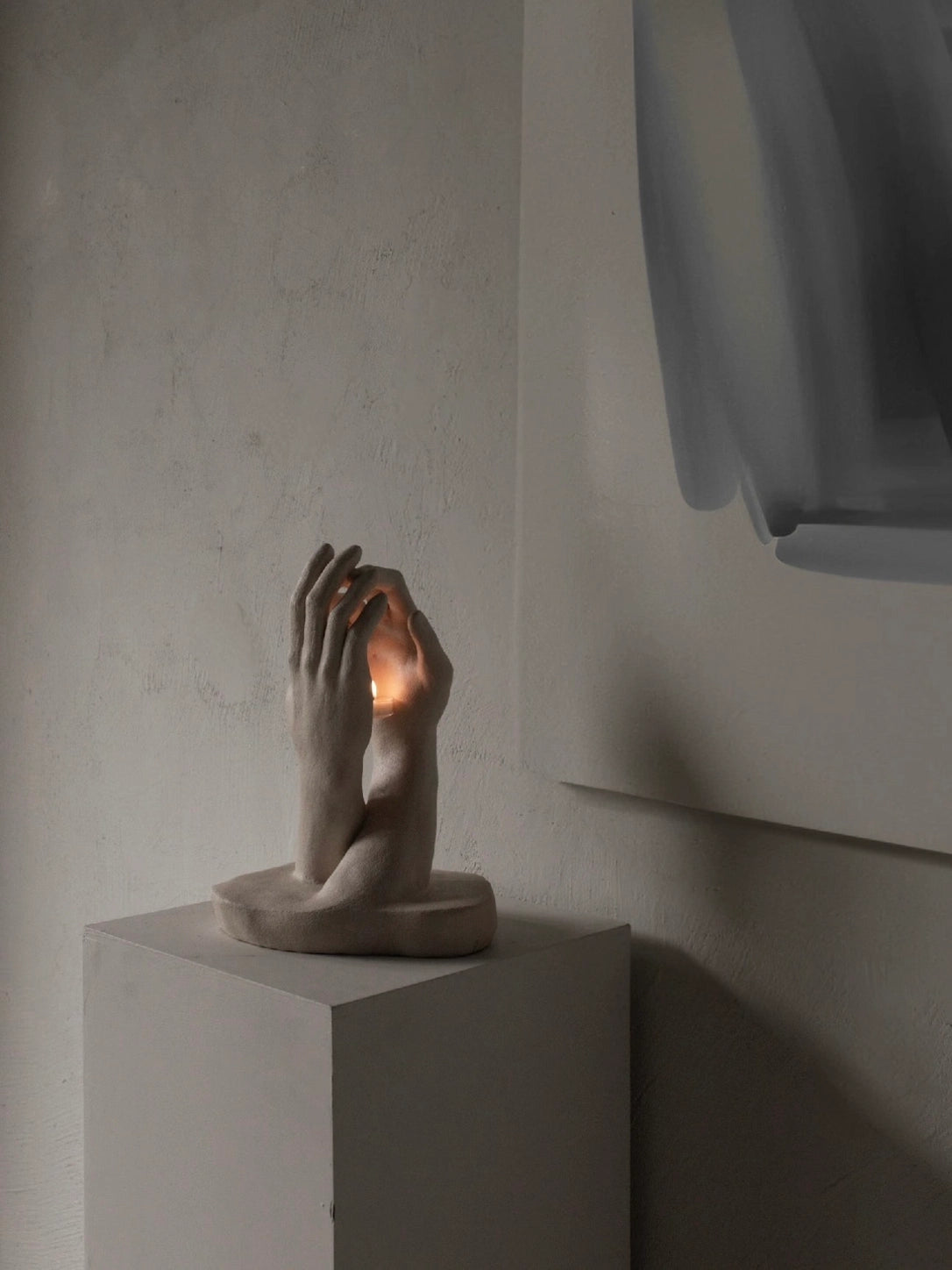 INTERLACED HANDS CANDLE HOLDER