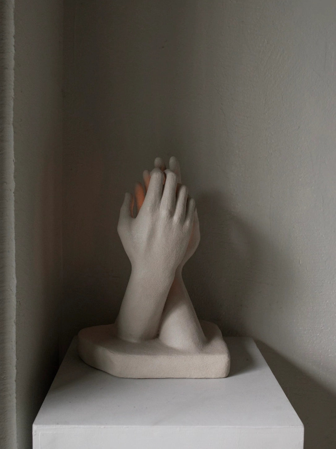 INTERLACED HANDS CANDLE HOLDER