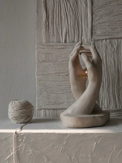 INTERLACED HANDS CANDLE HOLDER