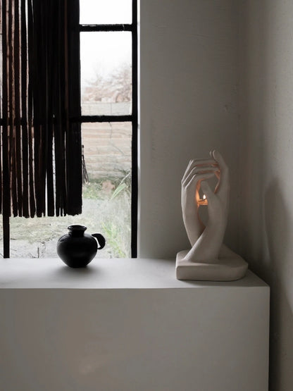 INTERLACED HANDS CANDLE HOLDER