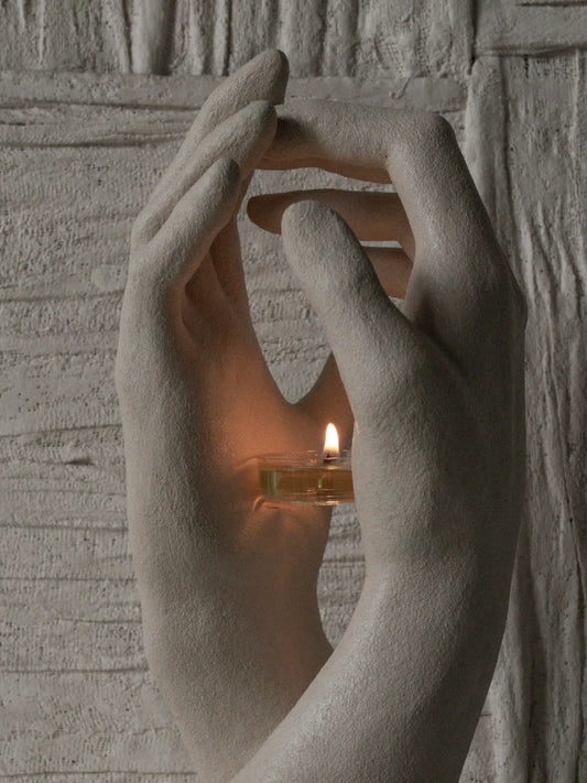 INTERLACED HANDS CANDLE HOLDER