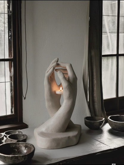 INTERLACED HANDS CANDLE HOLDER