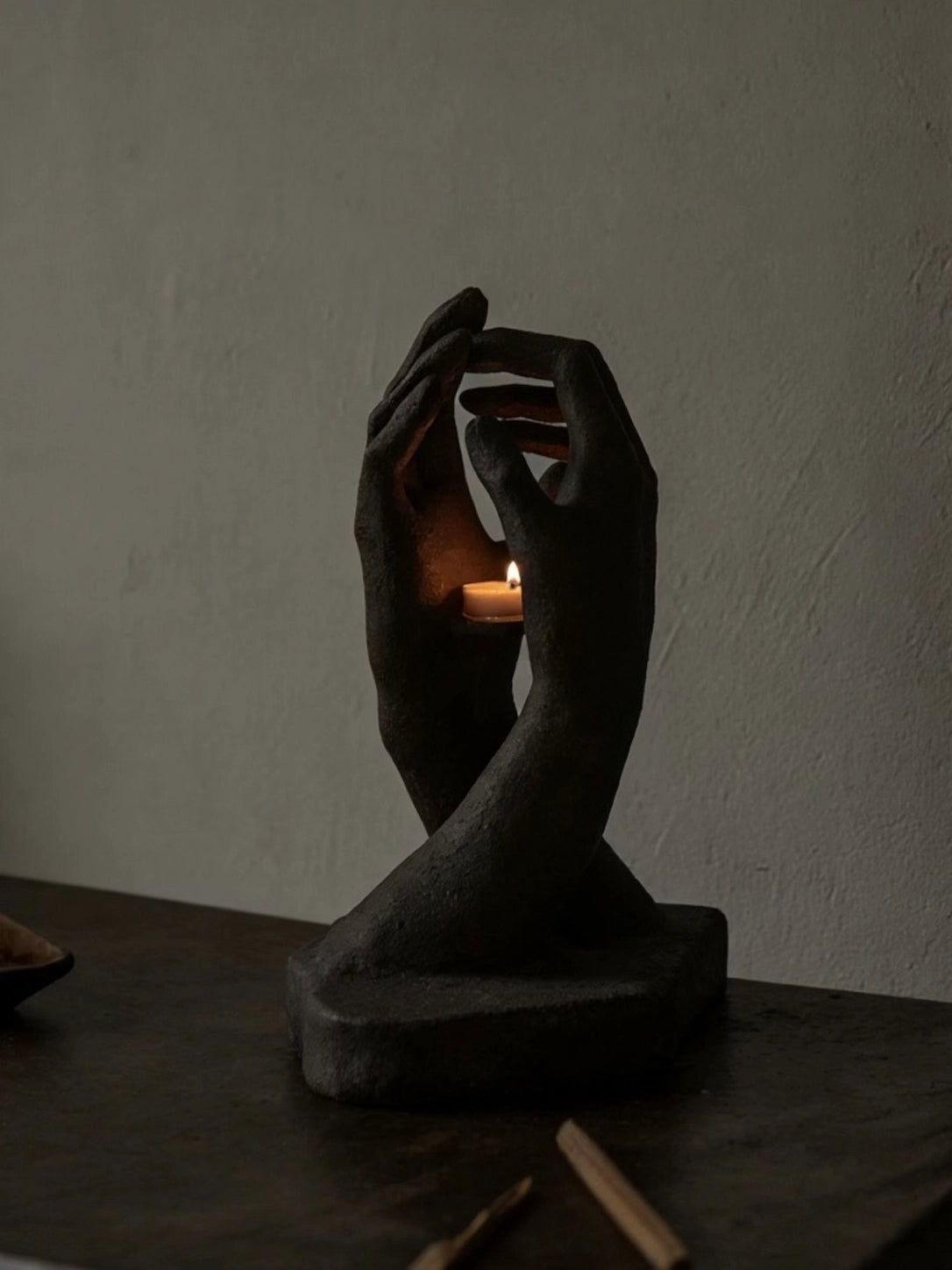 INTERLACED HANDS CANDLE HOLDER